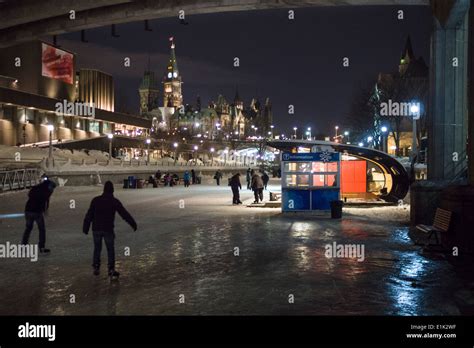 Rideau Skateway and Parliament at Night. Skaters on the Rideau Canal ...