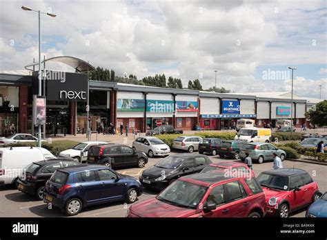 Terrace of shop units, including Next, Festival Retail Park, Stoke-on-Trent Stock Photo - Alamy