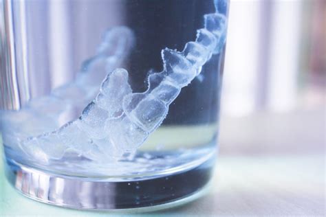 Tips and Tricks For Keeping Invisalign Aligners Clean - Hoffman Dental Care