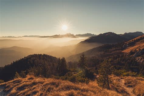 Sunset in the grassy hills in autumn featuring sunset, hills, and ...