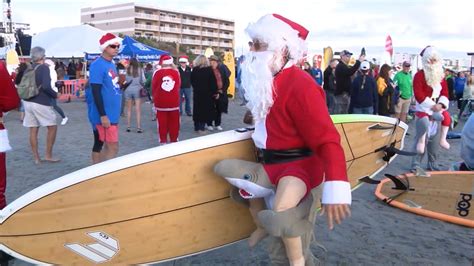 Surfing Santas hit Cocoa Beach | FOX 35 Orlando