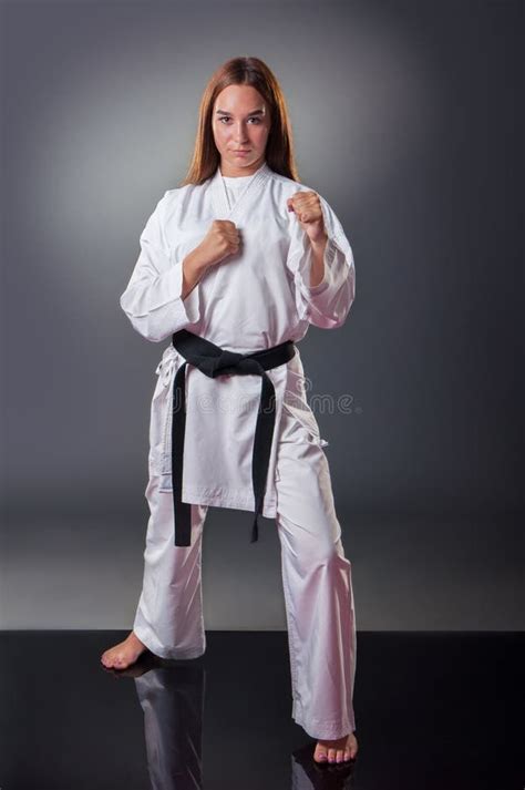 Group of Beautiful Young Female Karate Players Celebrating on the Gray ...