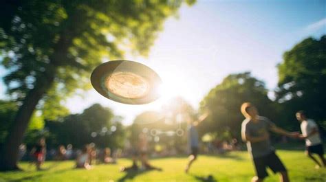 Group of People Playing Frisbee in the Park stock photo | Creative Fabrica