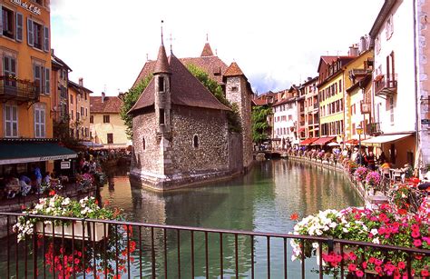 Spring Flowers and Old Castle in Annecy France Photograph by Robert Ford