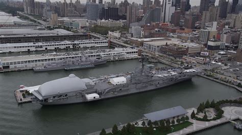 4K stock footage aerial video Flying by USS Intrepid, New York, New ...