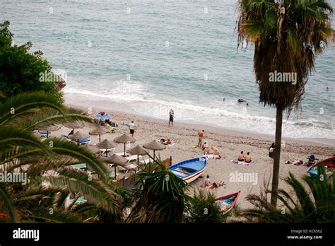 A beach in Nerja, Spain Stock Photo - Alamy