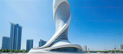 A beautiful modern skyscraper with a futuristic design is seen in the downtown area of the city ...