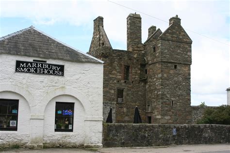 Background is Carsluith Castle (also known as Brown's castle), on Wigtown Bay, in Scotland ...