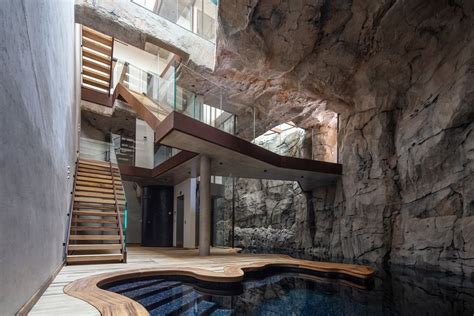 Modern Cave Villa Built into a Massive Rock with Underground Grotto | Architecture, Amazing ...