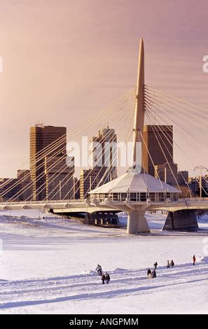 Downtown Winnipeg skyline and frozen Red River on a frosty winter day ...