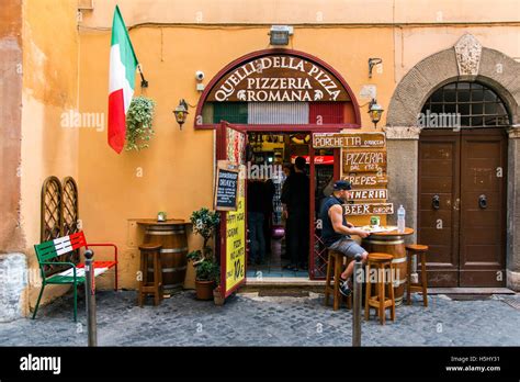 Pizzeria restaurant with Italian flag, Rome, Lazio, Italy Stock Photo - Alamy