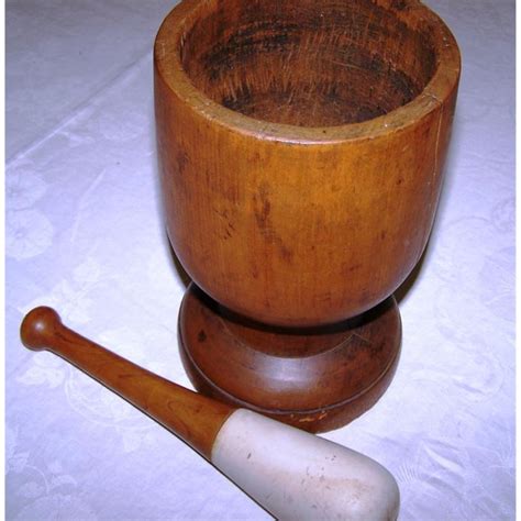 Wooden mortar and pestle.