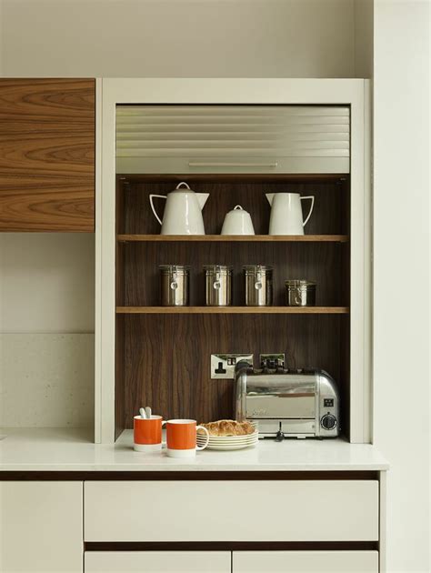 Tambour door on cabinet in Roundhouse Urbo matt lacquer bespoke kitchen | Contemporary kitchen ...