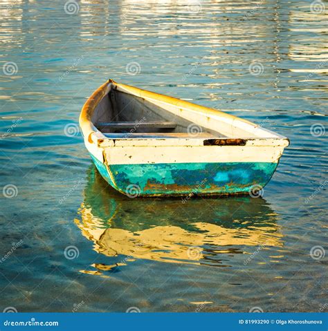 Old fishing boat at sunset stock photo. Image of transport - 81993290