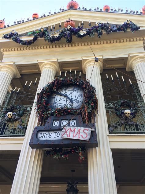 Haunted Mansion Clock at Disneyland, decorated for holidays; Anaheim ...