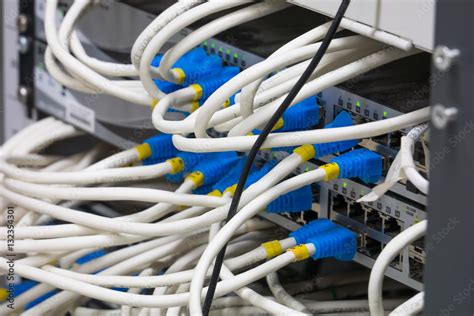 Network switch HUB and ethernet cables (LAN) in datacenter Stock Photo ...