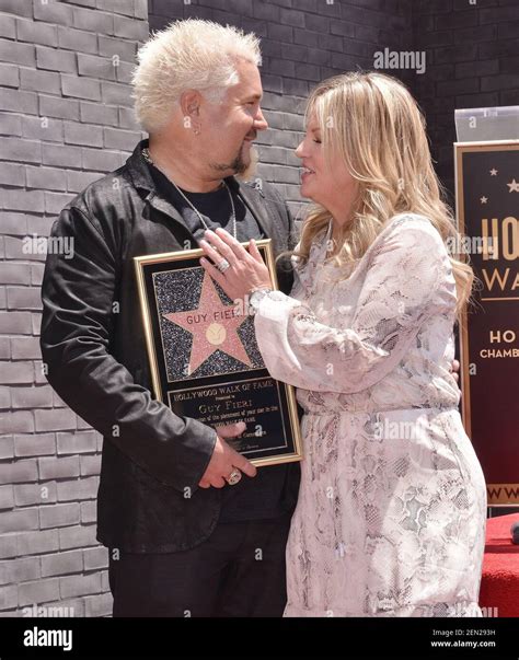 (L-R) Guy Fieri and Wife Lori Fieri at his Star On The Hollywood Walk ...