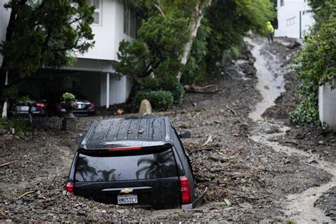 Record-setting storm that killed 3 dumps rain on Los Angeles; flash ...