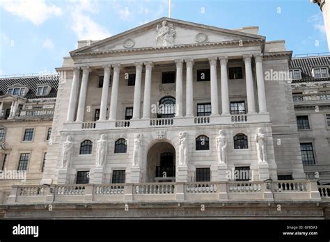 Bank of England building exterior facade, figures and Old Lady of Threadneedle Street in the ...