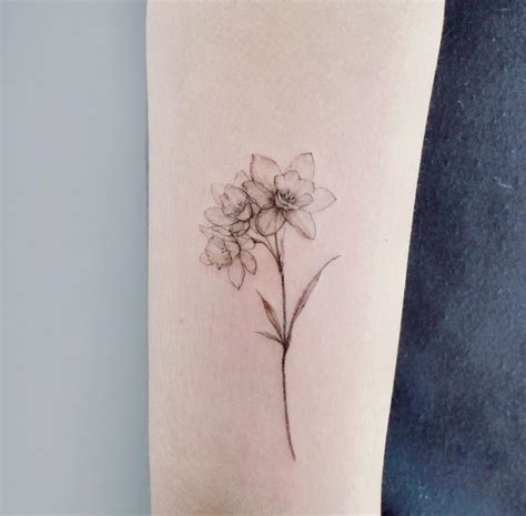 These Birth Flower Tattoos Will Make You Forget About Your Zodiac Sign Dainty Flower Tattoos ...