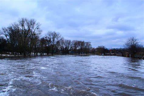 Premium Photo | Flooding of river in spring in town during melting of snow flooding city flood ...