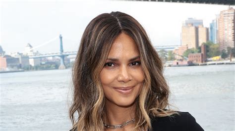 Halle Berry, 57, looks decades younger as she goes topless in just ...