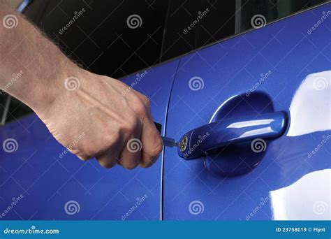 Unlocking a car door stock image. Image of security, selling - 23758019