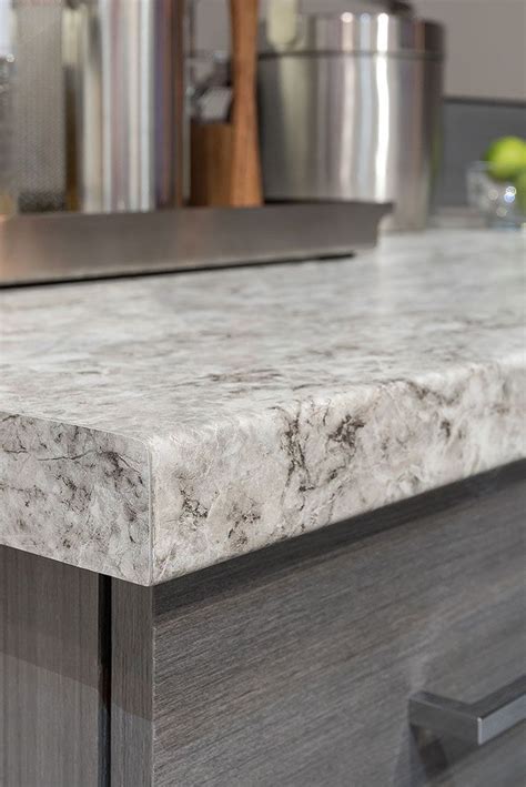 Postformed countertops are capped with matching SOLICOR™ Laminate to eliminate th… | Kitchen ...