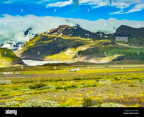 View of air field and airplane at the Vatnajokull Glacier in Iceland Stock Photo - Alamy