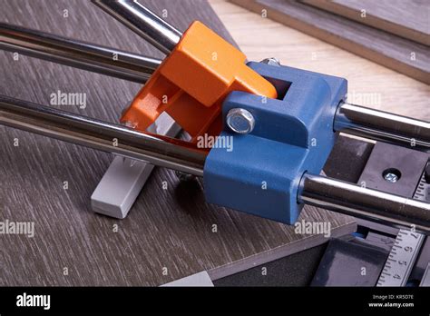 Manual cutter ceramic tile Stock Photo - Alamy