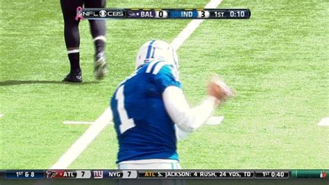 Indianapolis Colts punter Pat McAfee celebrates great punt