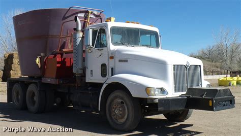 1999 International 9100 vertical feed mixer truck in Boone, CO | Item DD6022 sold | Purple Wave