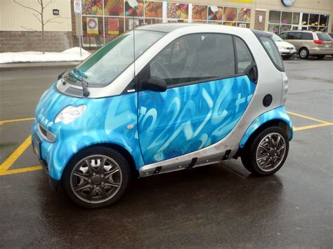 A Smart Car covered in blue twos. | Smart car, New smart car, Cute cars