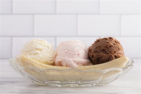 Banana Split without Toppings on a Kitchen Cabinet Stock Photo - Image of scoops, gourmet: 154983478