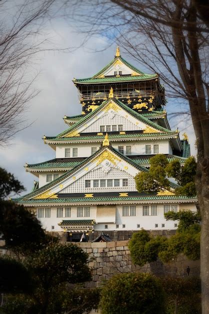 Premium Photo | Osaka castle with cloudy sky in winter season