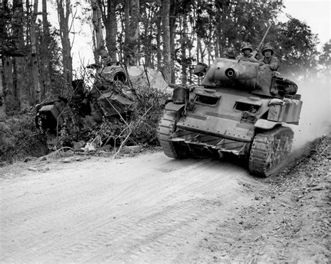 M8 GMC and Panzer Lehr Division Panther tank St Gilles France july 1944 | World War Photos