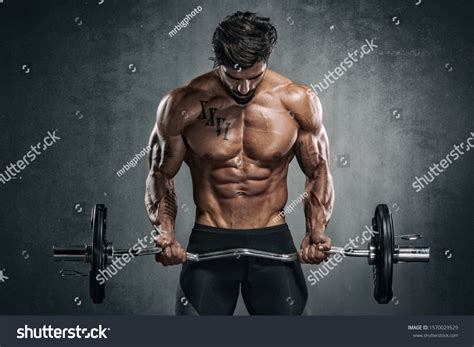 Handsome Muscular Men Lifting Weights Stock Photo 1570029529 | Shutterstock