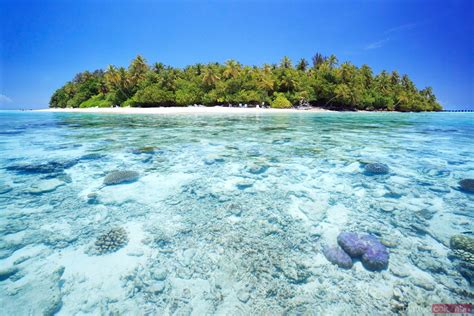 Matteo Colombo Travel Photography | Coral reef and tropical island in ...