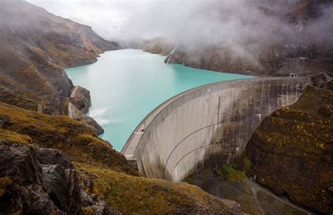 FANS OF NATURE: Mauvoisin Dam is a concrete arch dam across the Val de ...