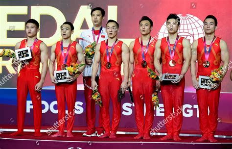 Chinese Gymnastics Team Stands On Podium Editorial Stock Photo - Stock ...