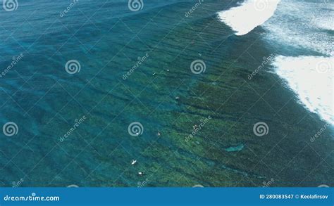 Blue Transparent Ocean with Waves and Surfers on Line Up. Aerial View ...