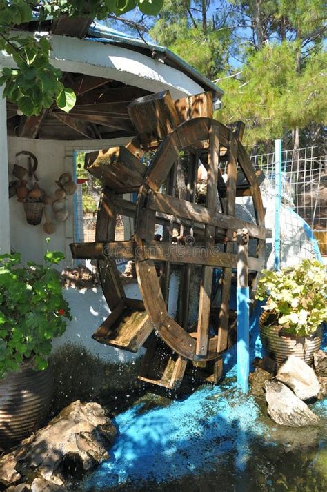 Garden With Water Mill Wheel Stock Photo - Image of flowing, mill: 122018