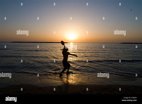 The beach in Tel Aviv during sunset Stock Photo - Alamy