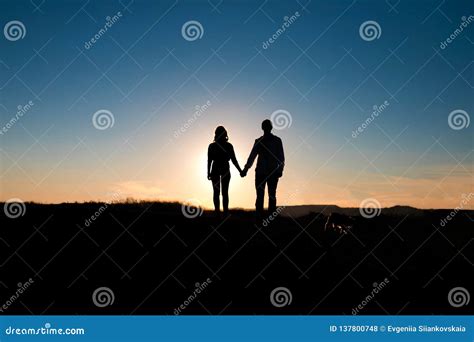 Romantic Couple Hug at Sunset on Background. Stock Photo - Image of nature, people: 137800748