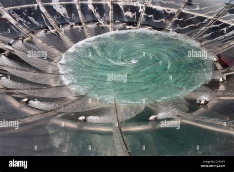 Whirlpool fountain with tornado water Stock Photo - Alamy