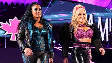 Nia Jax and Shayna Baszler react to their Tag Team titles loss