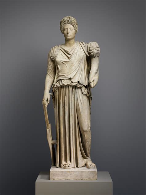 Marble statue of Tyche-Fortuna restored with the portrait head of a ...