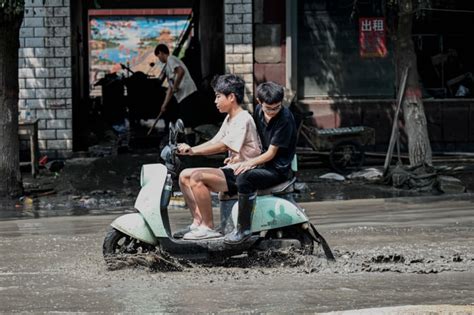 Beijing's flooding death toll rises to 33, with 18 still missing | CBC News