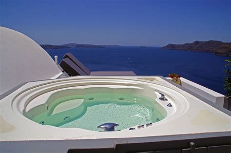 Jacuzzi at Nostos Apartments Oia Santorini | Santorini, Beautiful islands, Santorini greece