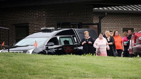 Rhoden family 'beyond devastation' as funeral held for 6 slain members